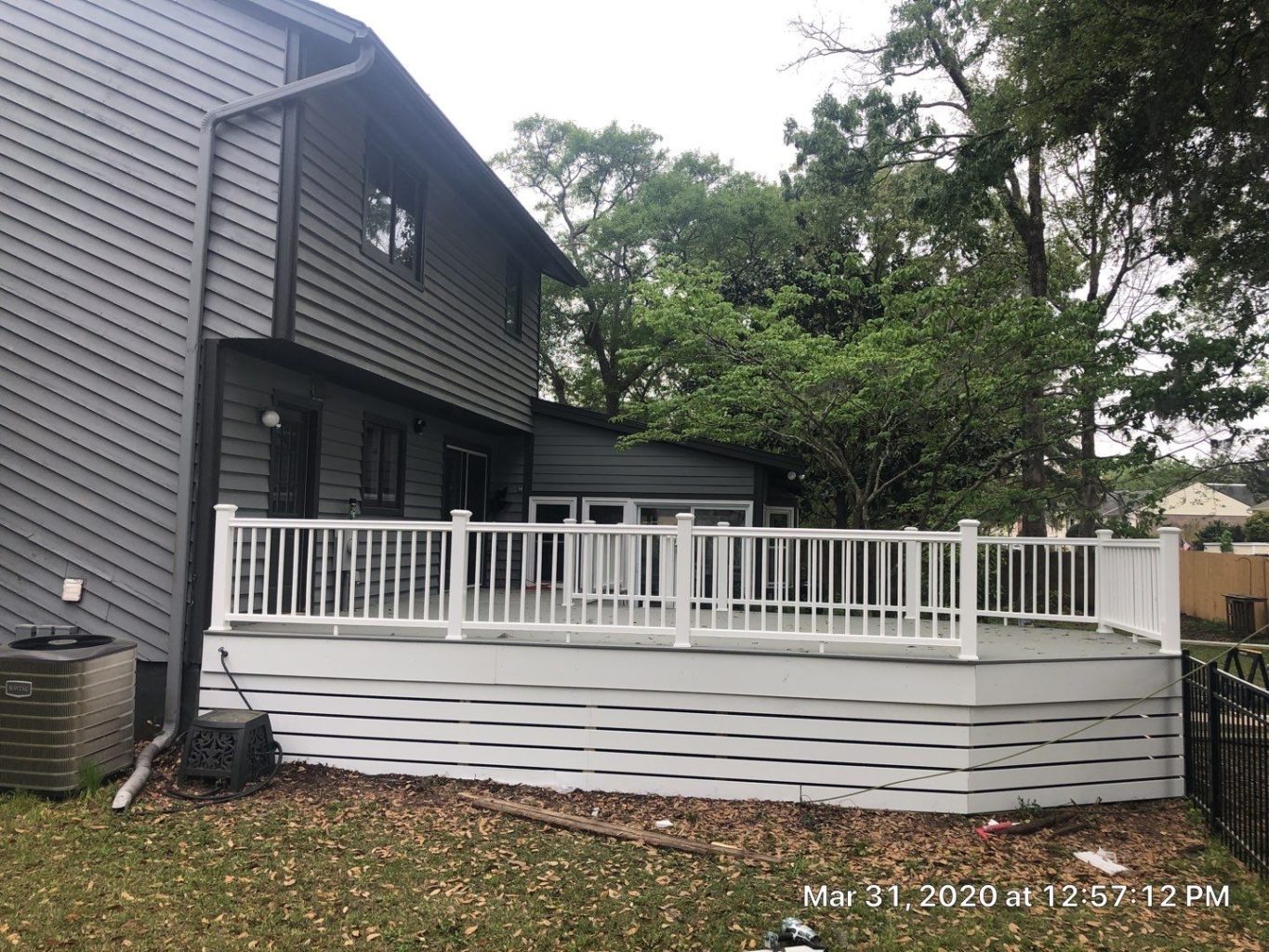 gray deck with white railing