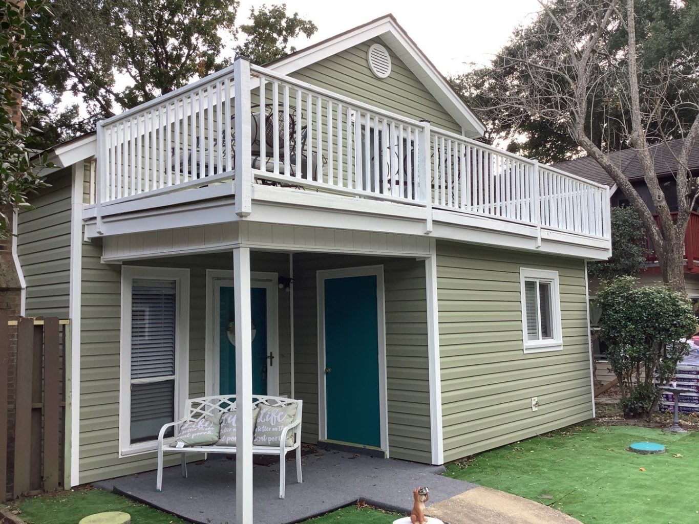 green vinyl siding on a house