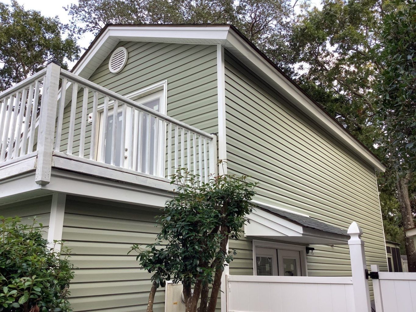 green vinyl siding on a house