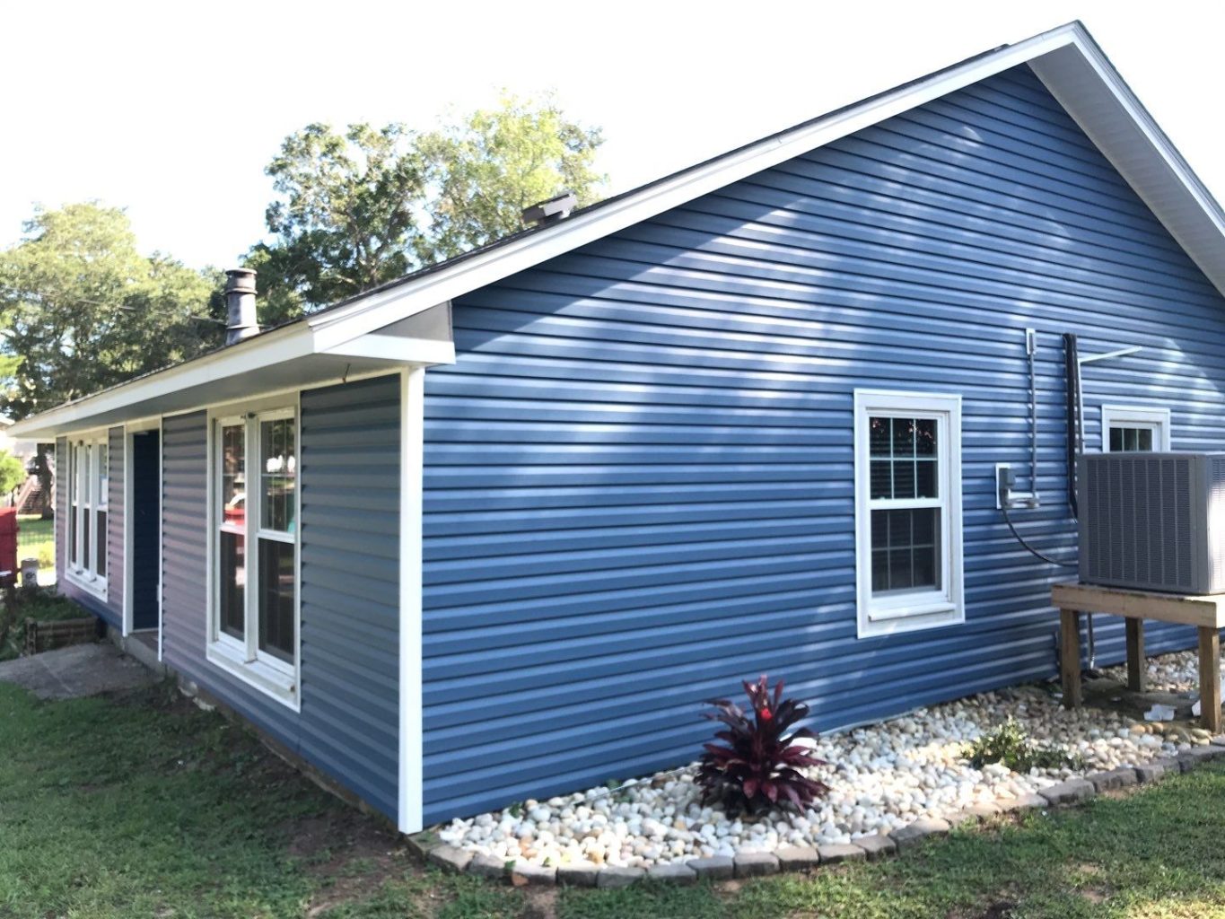 blue vinyl siding on a house